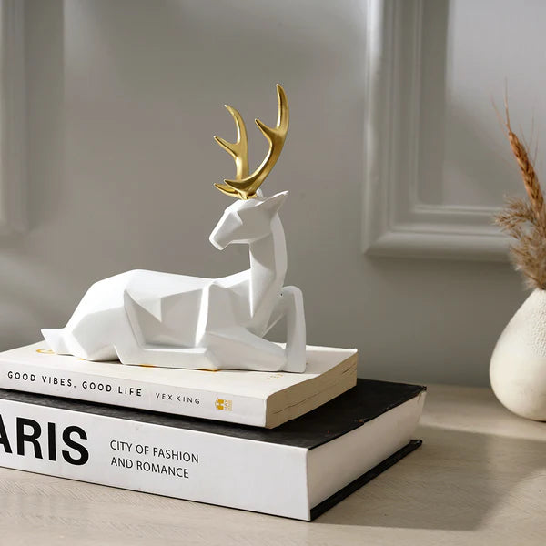 FACETED SITTING ANTLER DECORATIVE SCULPTURE