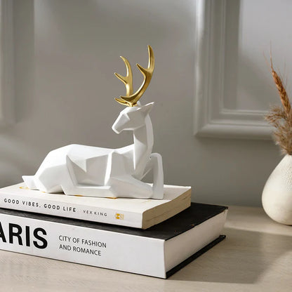 FACETED SITTING ANTLER DECORATIVE SCULPTURE