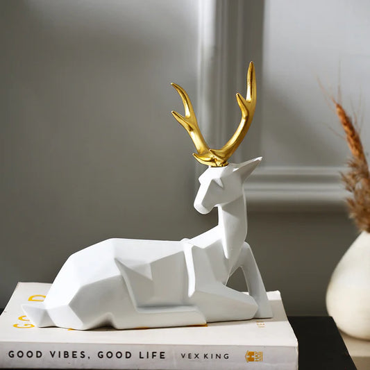 FACETED SITTING ANTLER DECORATIVE SCULPTURE