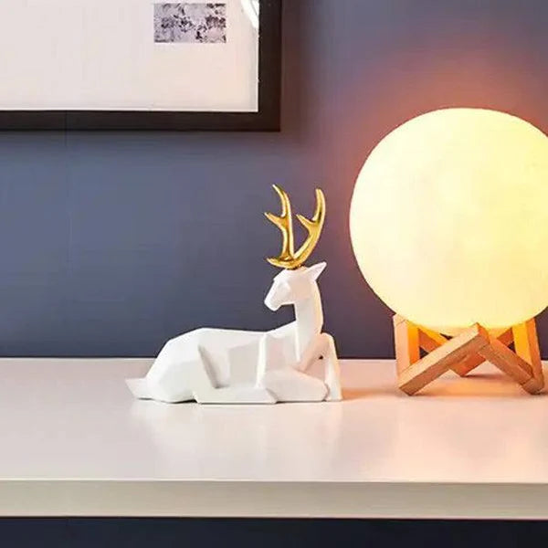 FACETED SITTING ANTLER DECORATIVE SCULPTURE