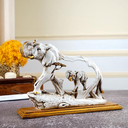 THE FENG SHUI GOLDEN ELEPHANT SHOWPIECE WITH WOODEN BASE