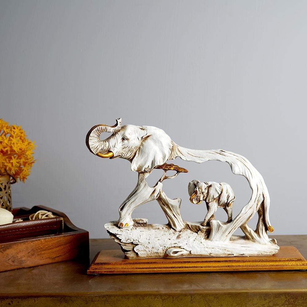 THE FENG SHUI GOLDEN ELEPHANT SHOWPIECE WITH WOODEN BASE