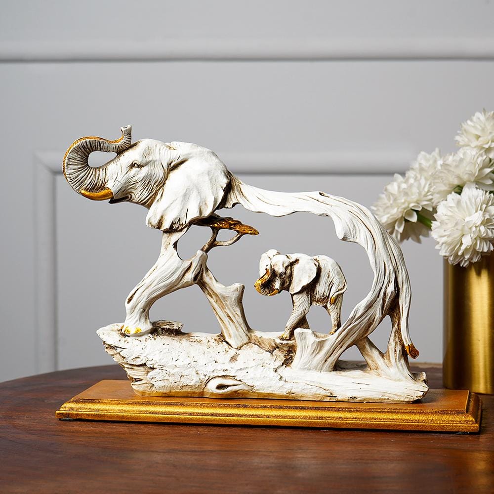 THE FENG SHUI GOLDEN ELEPHANT SHOWPIECE WITH WOODEN BASE