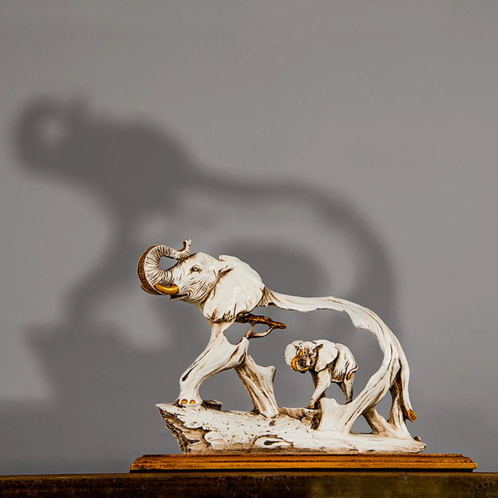 THE FENG SHUI GOLDEN ELEPHANT SHOWPIECE WITH WOODEN BASE